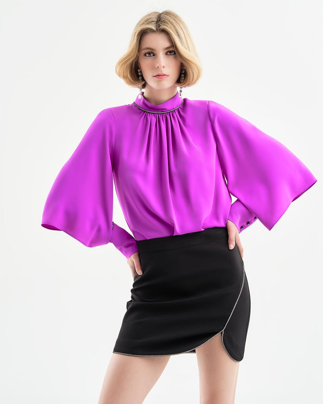 Blouse with rhinestones and sleeve openings