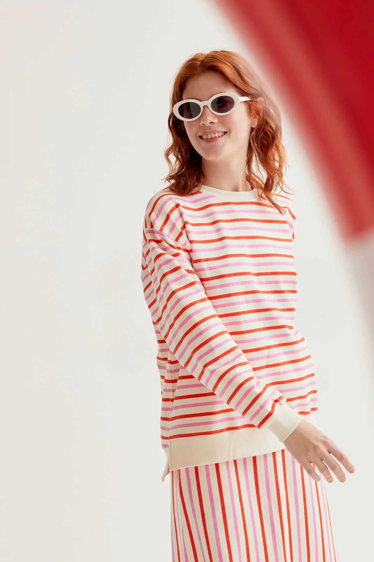 Midi skirt with pink and red striped print